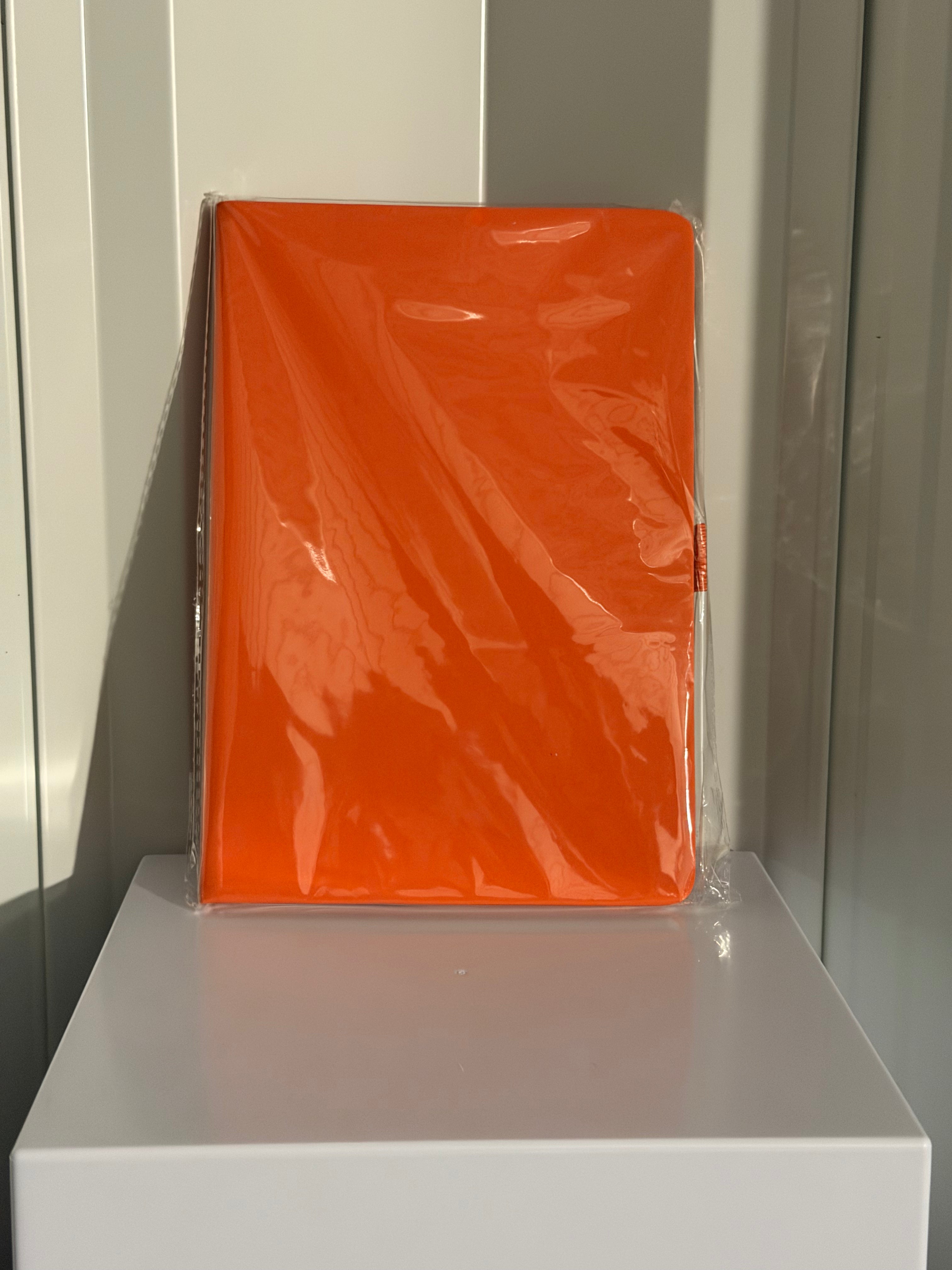 ORANGE A5-SIZED SPIRAL-BOUND NOTEBOOK