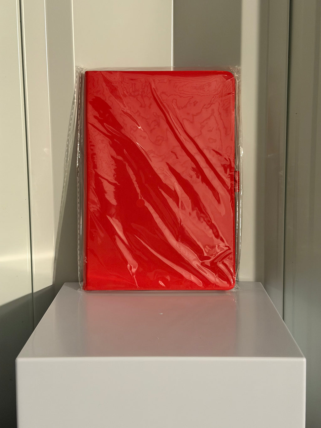 RED A5-SIZED SPIRAL-BOUND NOTEBOOK